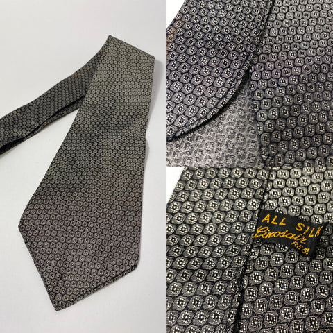 1930s Linosair silk tie black and white pattern for morning suit/dress attire. No lining and open backs with short blade at 115cm long 10cm wide. No damage.
