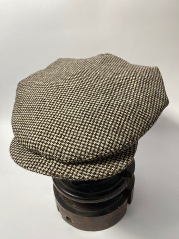 1930s pattern cap, reproduction in a 10.5” wide crown. hand made in a vintage cloth in white and dark brown small dog tooth. Lined in cream satin twill. To fit a size 58cm.