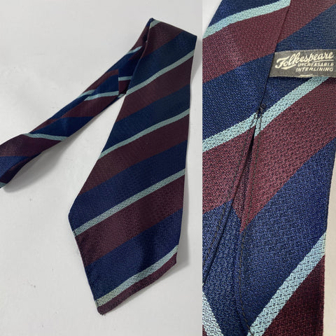 1940s RAF tie by Folkspeare in regimental stripes. No lining and open backs with typical short blade at 120cm long and 9 cm wide.