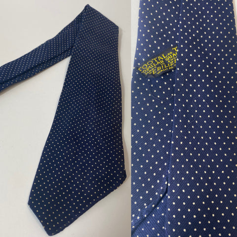 1940s Tootal tie yellow quality label. Blue with white spots. No lining, open backs and short blade at 120cm long 9cm wide. No damage.