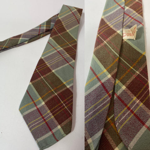1940s Duggie tie all wool in green brown and red plaid pattern. No lining and open backs with short blade at 120cm long 8cm wide. No damage.