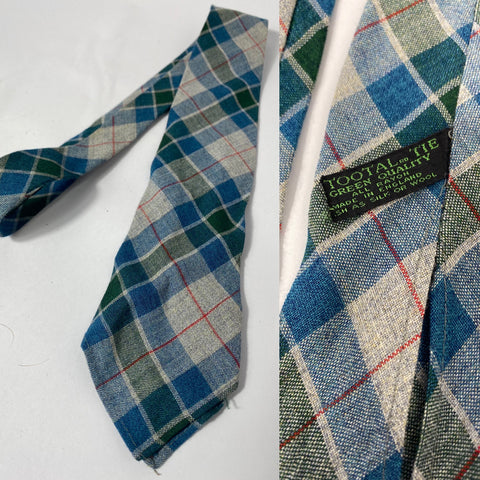 1940s Tootal tie in green quality label in light grey, teal, green and red plaid pattern. No lining and open backs with short blade at 130cm long and 8cm wide. No damage.
