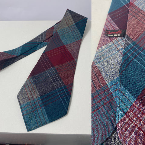 1940s tie by Grenville in teal maroon and grey plaid. No lining and open backs with short blade at 118cm long and 9cm wide. No damage.