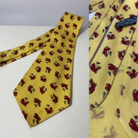 1940s tie sports quality tootal in yellow with brown horse design. No lining and open backs with short blade at 125cm long and 10cm wide. No damage.